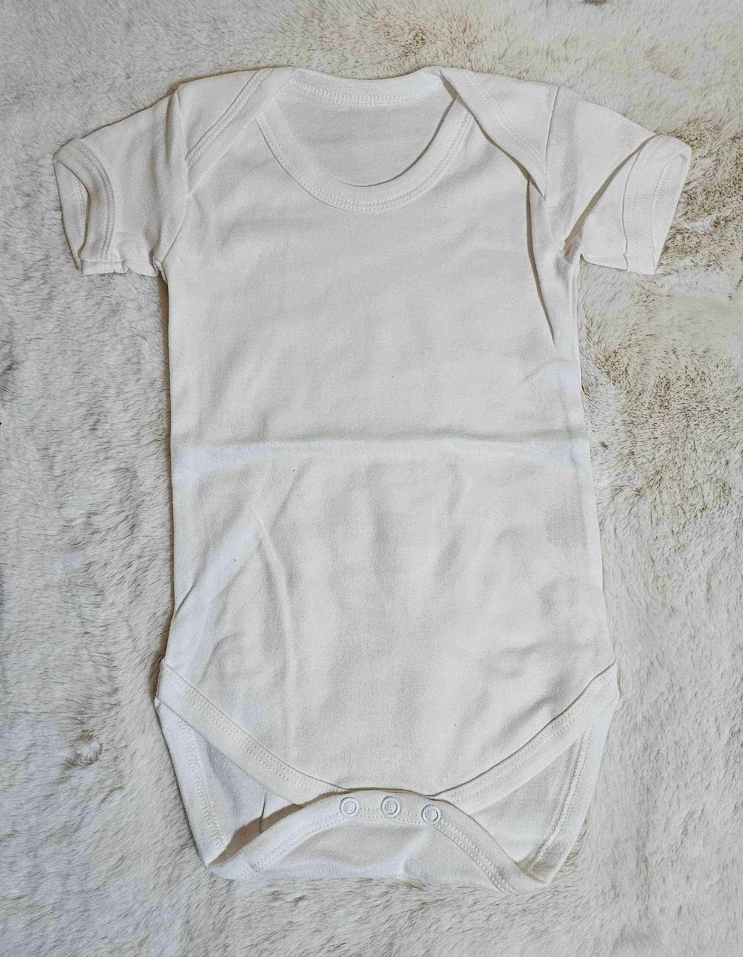 White baby vest