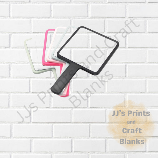 Hand held beauty mirror